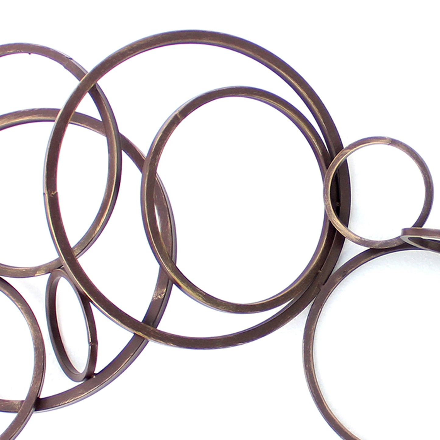 Industrial Style Metal Wall Decor With Multiple Circles Bronze