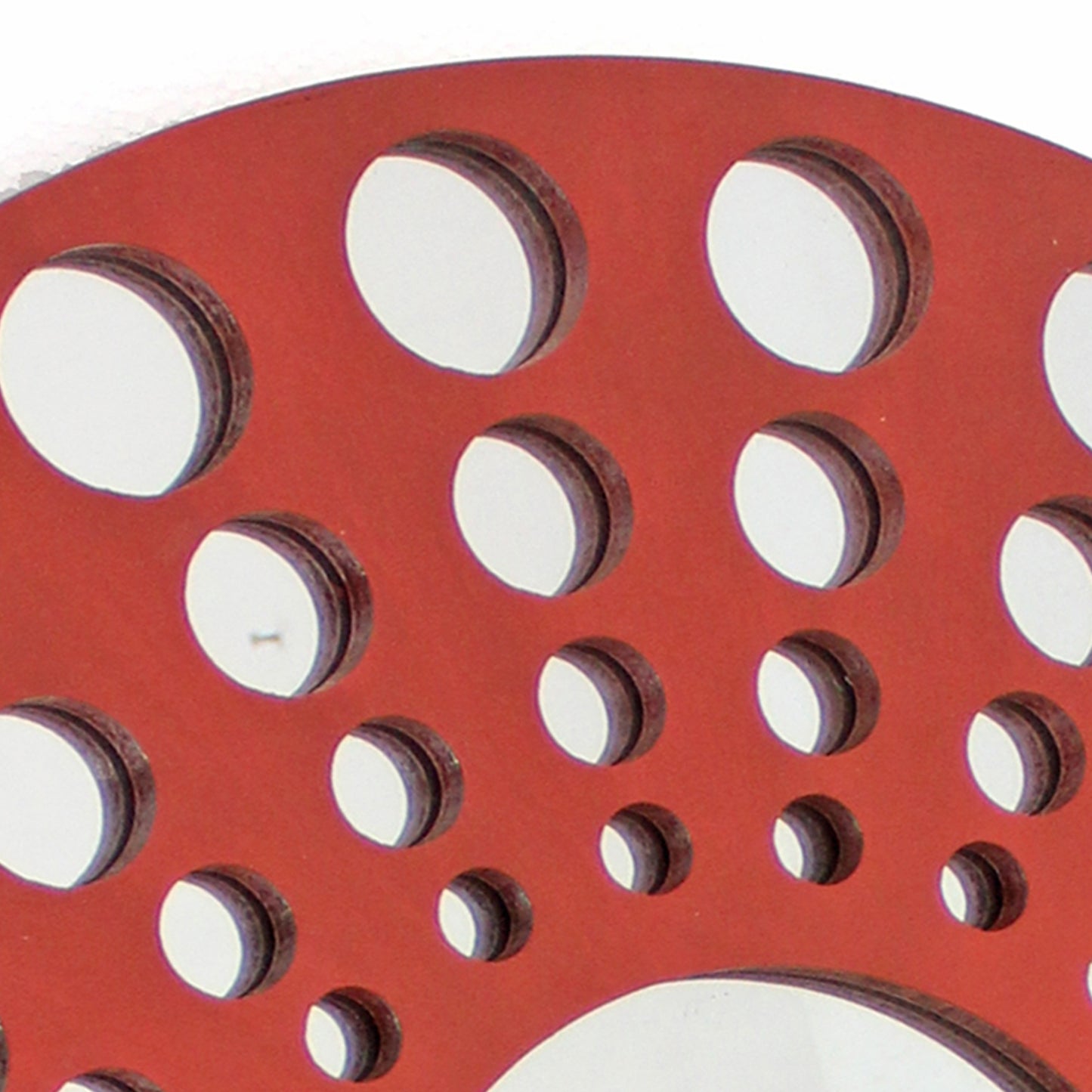 Contemporary Wooden Round Wall Decor With Circle Cut Outs Red And Silver