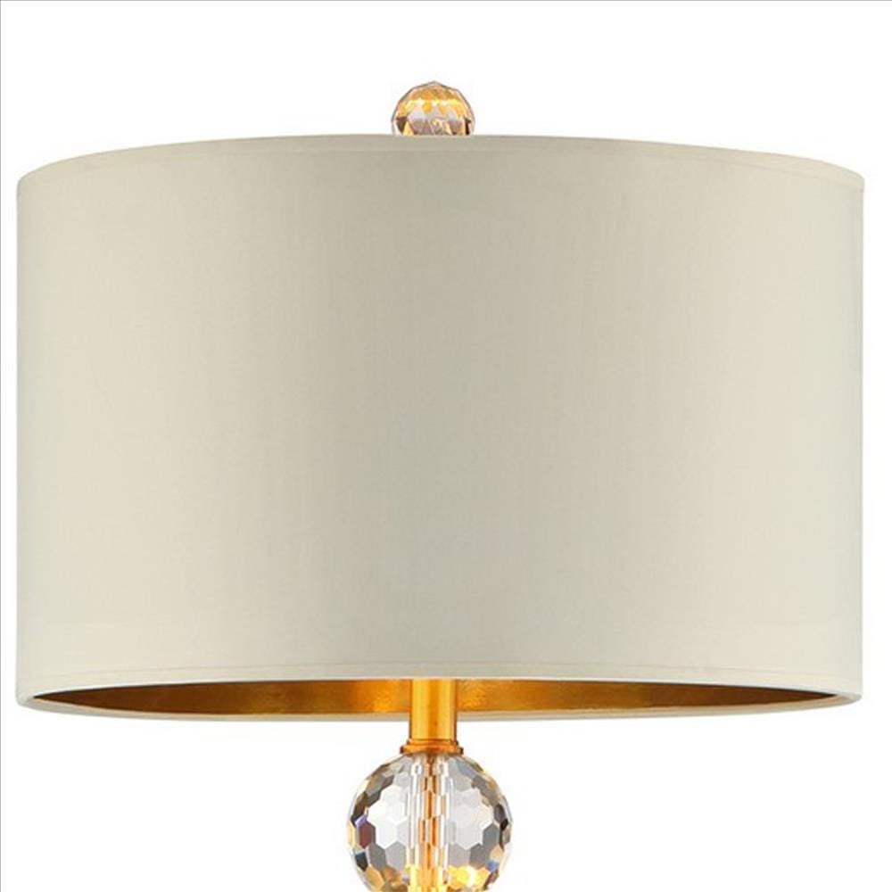 Floor Lamp With Crystal Orb And Metal Stalk Support Gold