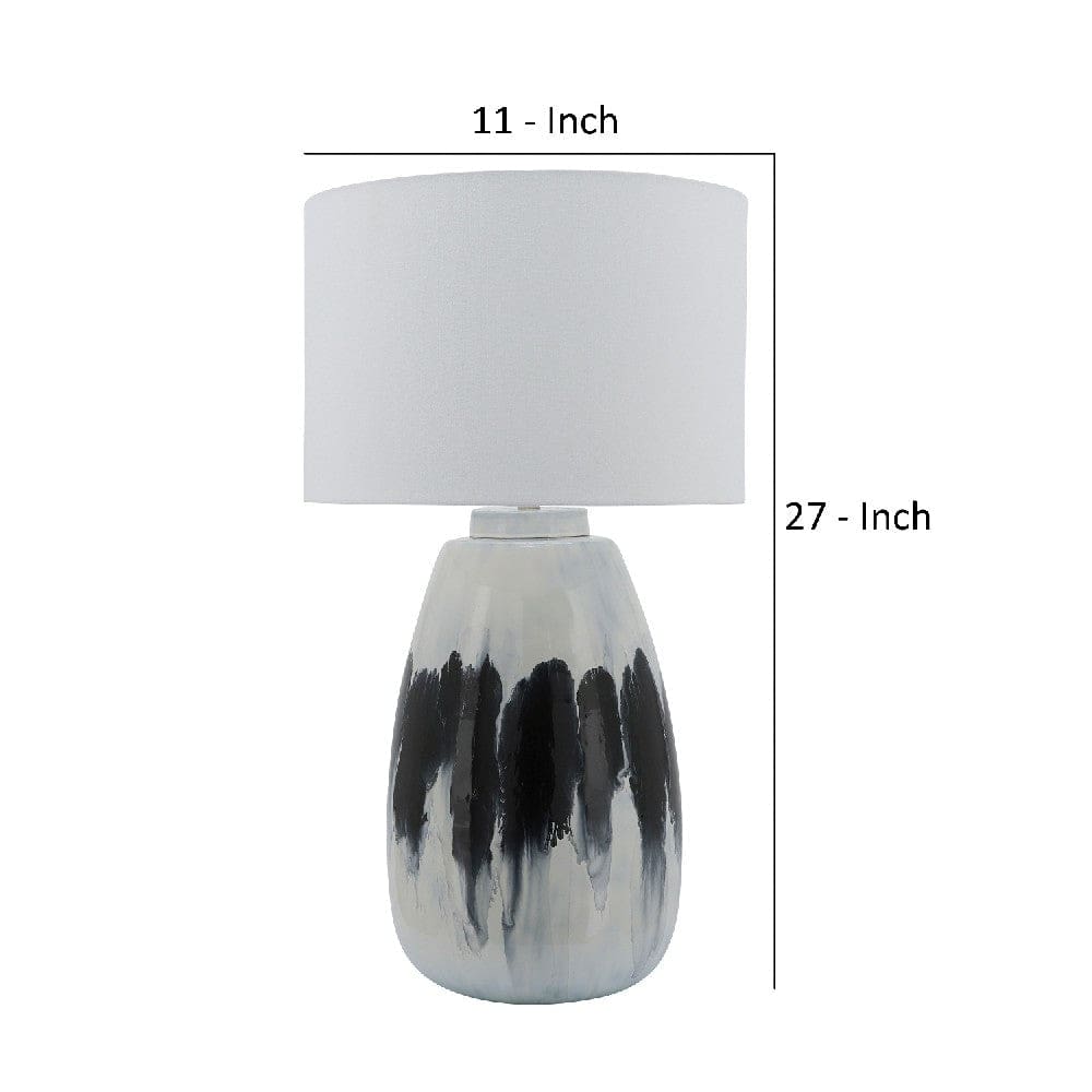 27 Inch Table Lamp with Painted Art Body Black and White